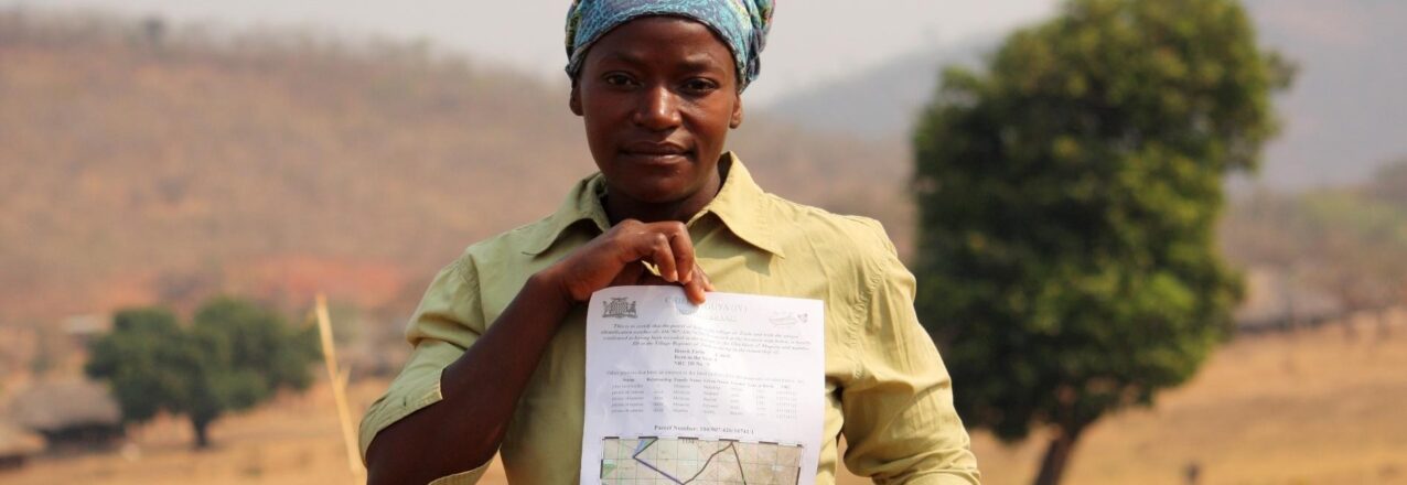 woman with land title