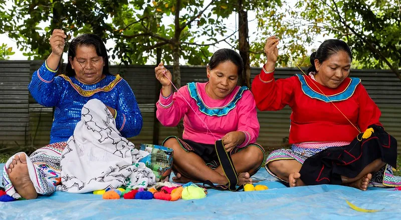 three women sewing