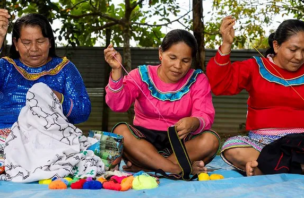 three women sewing