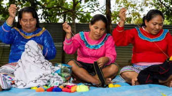 three women sewing